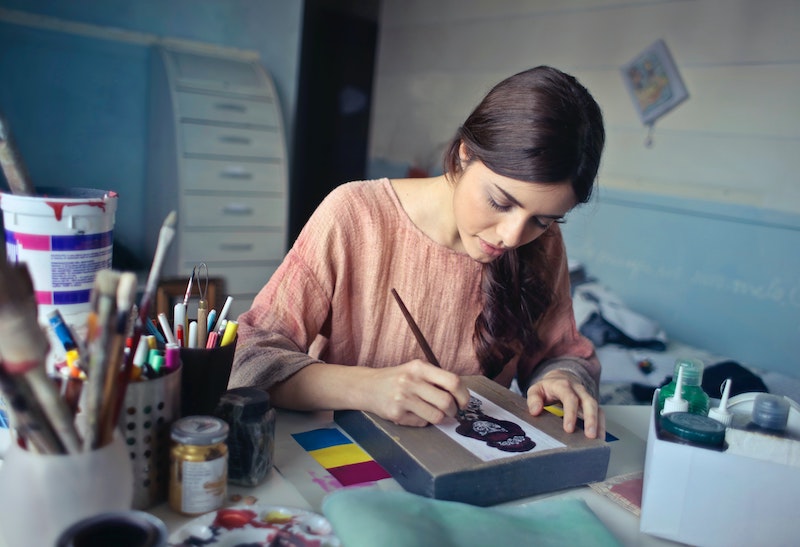 woman painting, self care